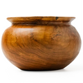 Wooden pot with a natural finish on a white background