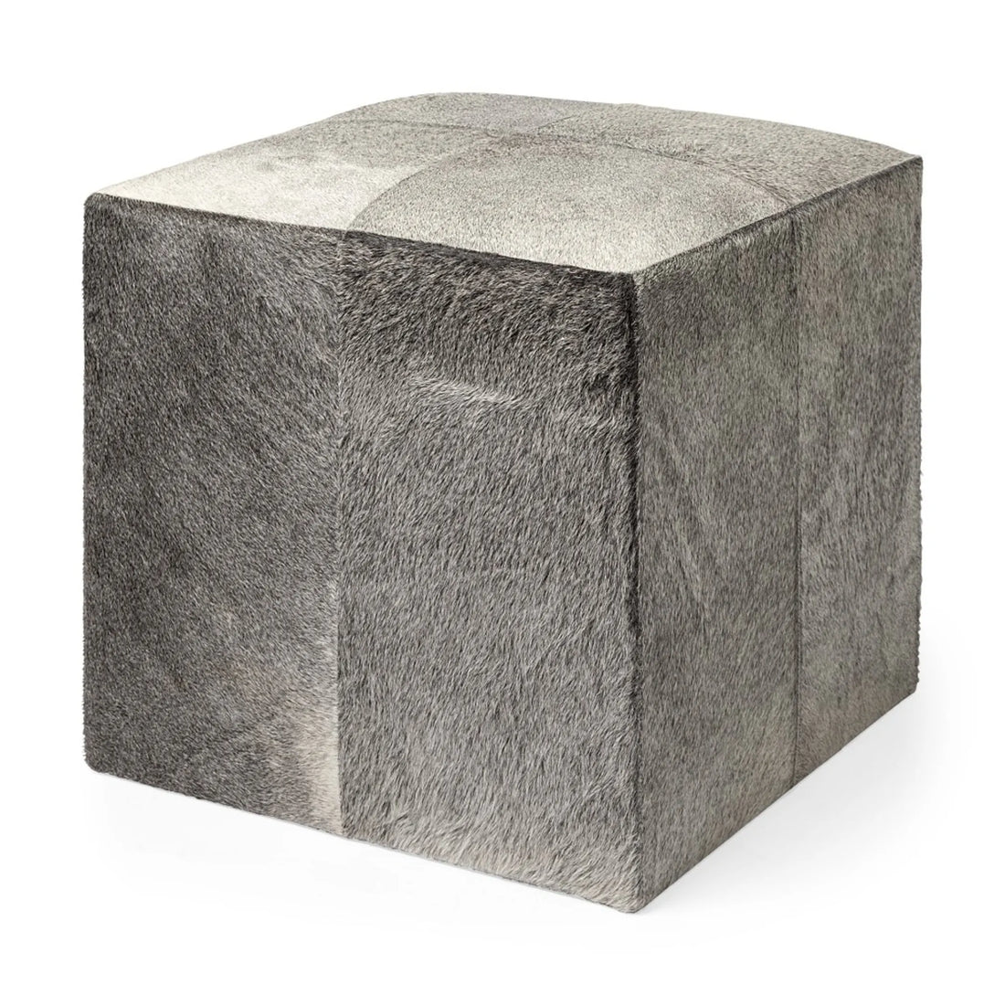 Cube-shaped ottoman with gray and white fur pattern on a white background